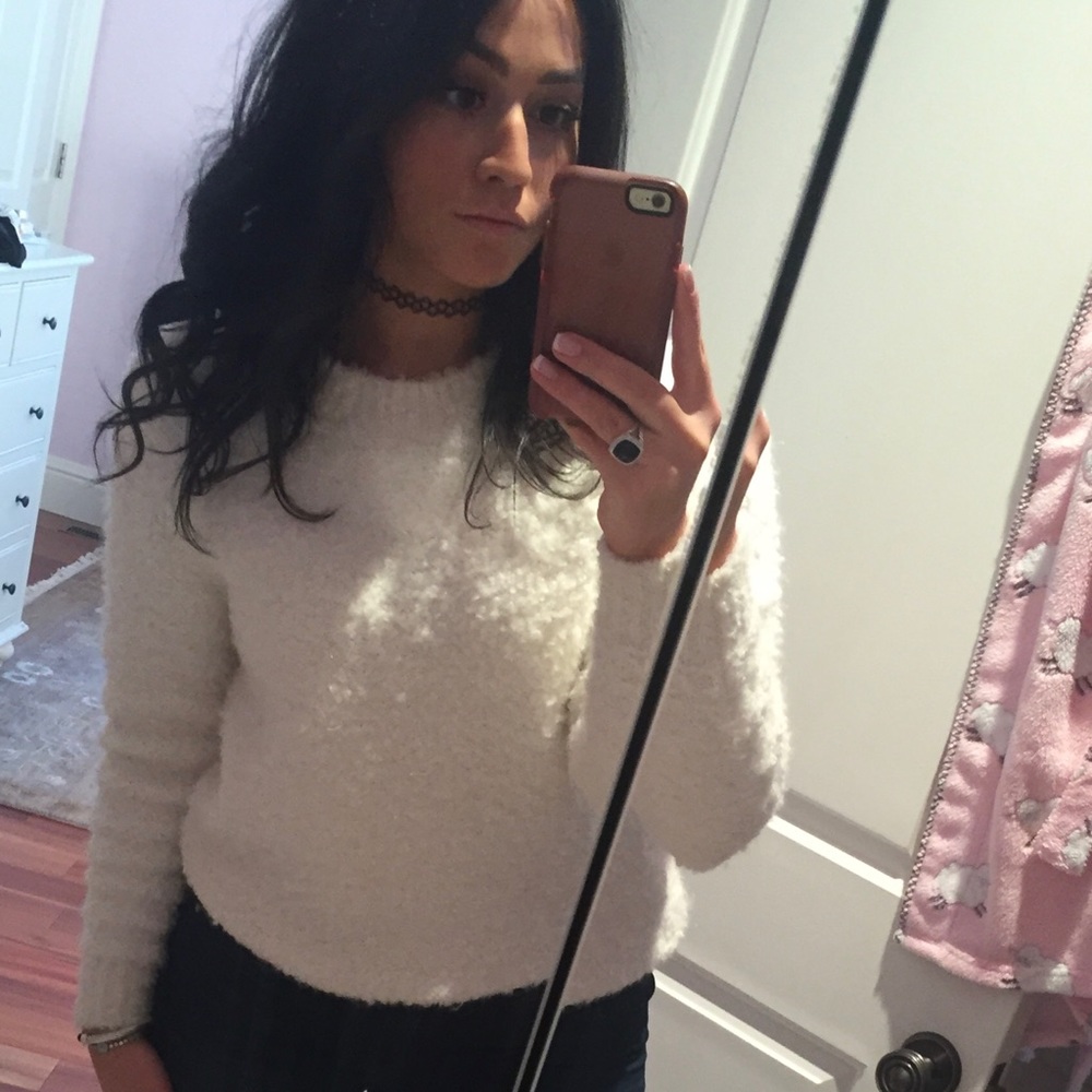 White teddy like sweater